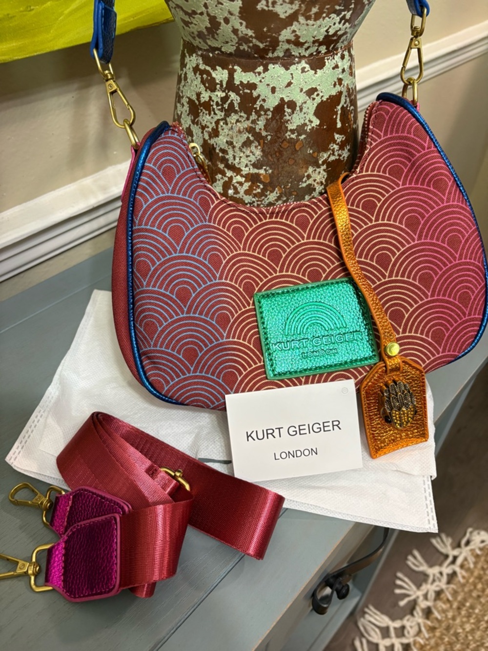 Fashion Inspired Pink and Blue Patterned Crescent Shoulder Bag with Green Patch